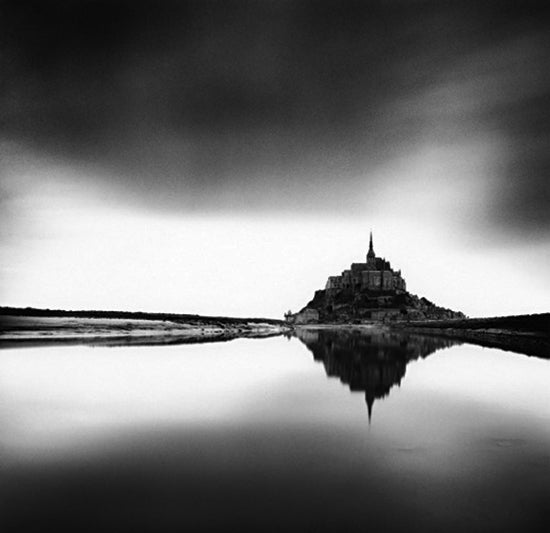 Michael Kenna, Midday Prayer, Mont St. Michel, France, 2004. Sepia-toned gelatin silver print, 7 1/4 x 7 1/2 inches. Courtesy of the artist and G. Gibson Gallery, Seattle.