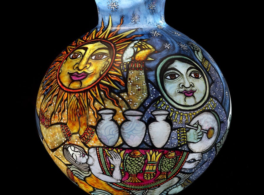 Blown glass vase with reverse painted enamels with figures representing the sun and the moon.