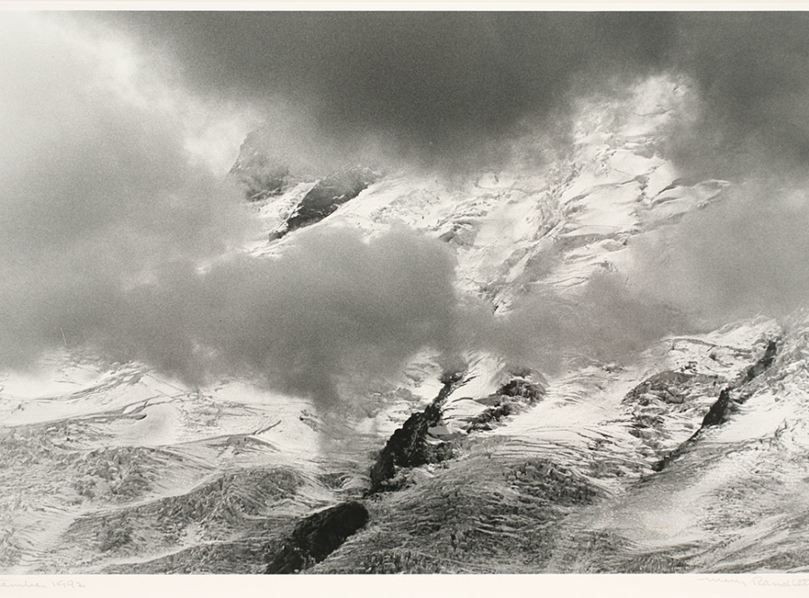 Photograph Credit Line: Museum purchase with funds from Nancy S. Nordhoff in honor of Mary Randlett Object number: 2008.8.20 DescriptionBlack and white photograph of snowy mountains seen through clouds.