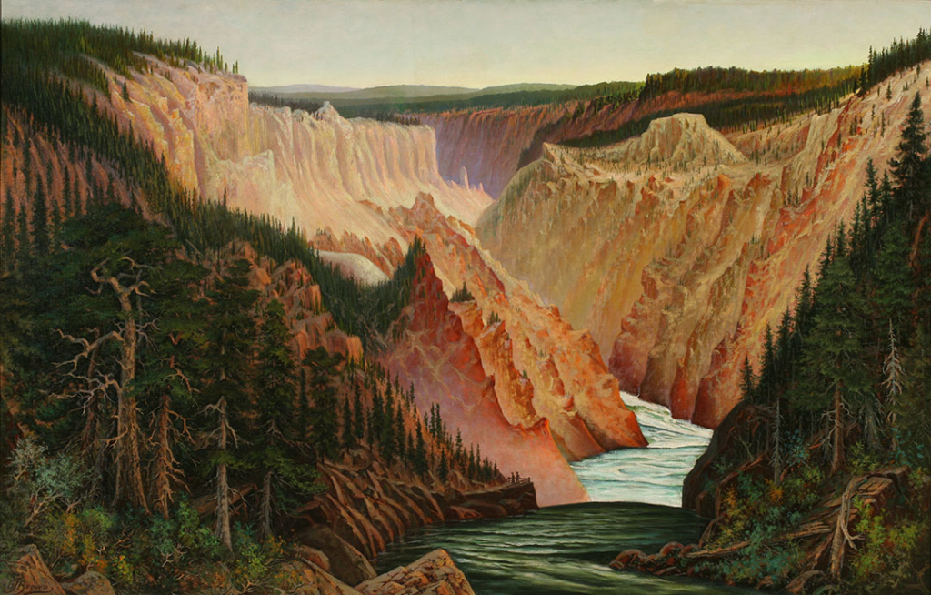 View up the canyon of the Yellowstone River. The river runs from the top center to bottom center of the picture. The steep eroded sides of the canyon frame the river on either side in pink, yellow, and white. On either side of the river in the foreground are patches of forest.