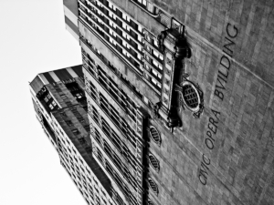 Black and white tilted angle view of a high rise building in Chicago.