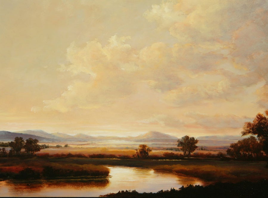 Wide view landscape scene depicting a river in the sunrise