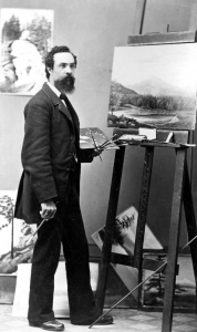 Black and white portrait of painter Grafton Tyler Brown in his studio.