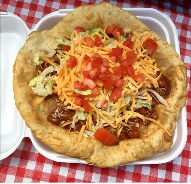 Color photo of frybread taco from cook and artist Michelle Price