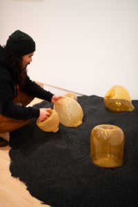 "Momentum" artist Trenton Quiocho installs "Trapped" 8