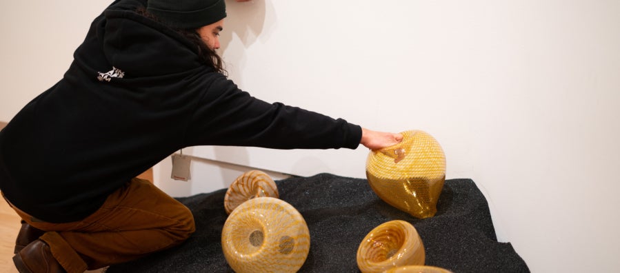 "Momentum" artist Trenton Quiocho installs "Trapped"
