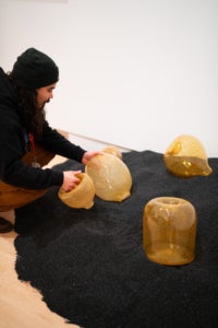 "Momentum" artist Trenton Quiocho installs "Trapped" 7