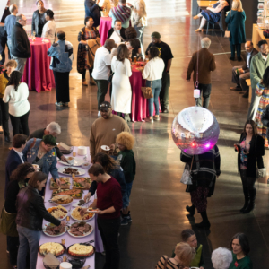 Patrons attending the opening party for an exhibition