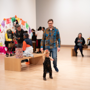 Families walking in the museum.